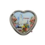 Caixa de Comprimidos, formato Coração, Aparição